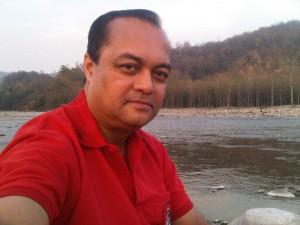 Photo of Joygopal Podder at the river